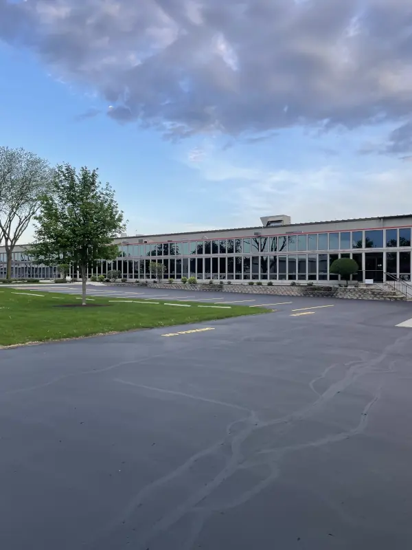 parking lot of office building with crack sealing and striping