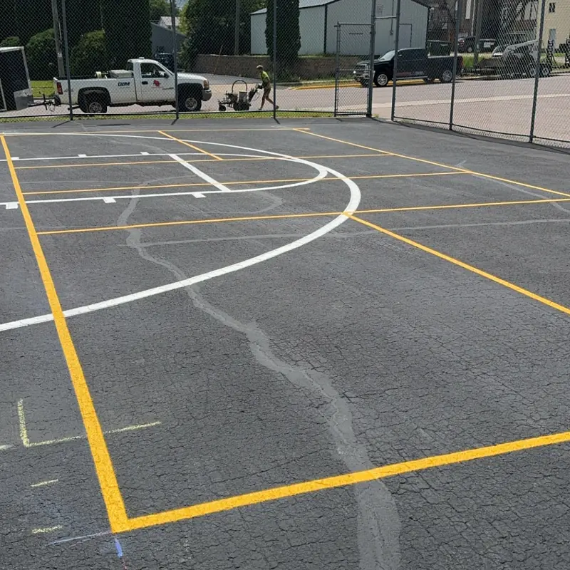 City playground sealcoated and striped